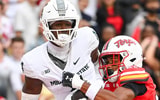 Michigan State Spartans wide receiver Jaron Glover (4) catches a pass for a touchdown as Maryland Terrapins defensive back Jalen Huskey (22) defends during the second quarter at SECU Stadium. - Tommy Gilligan, USA TODAY Sports