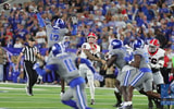 Kentucky's defense tries to make a play vs. Georgia quarterback Carson Beck - Dr. Michael Huang, Kentucky Sports Radio