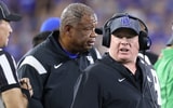 Mark Stoops and Vince Marrow on the sideline for Kentucky vs. Georgia