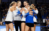 Kentucky volleyball players huddle - UK Athletics