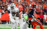 Aug 31, 2024; Syracuse, New York, USA; Ohio Bobcats running back Anthony Tyus III (2) runs the ball against the Syracuse Orange during the first half at the JMA Wireless Dome. Mandatory Credit: Rich Barnes-Imagn Images