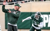 Michigan State's Khris Bogle, right, runs a drill with rush ends coach Chad Wilt during the Spring Showcase on Saturday, April 20, 2024, at Spartan Stadium in East Lansing - Nick King, USA TODAY Sports