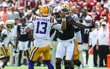 South Carolina QB Kyle Kennard chases down LSU QB Garrett Nussmeier (Photo: Katie Dugan | GamecockCentral.com)