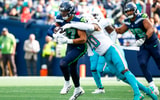 Seattle Seahawks tight end Noah Fant (87) runs for yards after the catch against the Miami Dolphins. (Photo by  Joe Nicholson-Imagn Images)