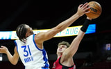 Jul 14, 2024; Las Vegas, NV, USA; Chicago Bulls forward Henri Drell (77) blocks a shot by Golden State Warriors forward Kevin Knox II (31) during the fourth quarter at Thomas &amp; Mack Center. Mandatory Credit: Stephen R. Sylvanie-USA TODAY Sports