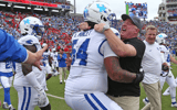 Sep 28, 2024; Oxford, Mississippi, USA; Kentucky Wildcats head coach Mark Stoops (right) reacts with Kentucky Wildcats offensive lineman Gerald Mincey (54) after defeating the Mississippi Rebels at Vaught-Hemingway Stadium. Mandatory Credit: Petre Thomas-Imagn Images