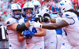Kentucky Wildcats celebrate with TE Josh Kattus following a touchdown, via Mont Dawson, KSR