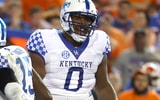 Sep 10, 2022; Gainesville, Florida, USA; Kentucky Wildcats defensive tackle Deone Walker (0) reacts after making a tackle against the Florida Gators during the second half at Ben Hill Griffin Stadium. Mandatory Credit: Kim Klement-Imagn Images