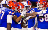 Florida Gators wide receiver Eugene Wilson III (3) signals a first down after hauling in a big pass play under Kentucky Wildcats defensive back JQ Hardaway (6) during the first half at Ben Hill Griffin Stadium in Gainesville, FL on Saturday, October 19, 2024 against the Kentucky Wildcats. [Doug Engle/Gainesville Sun]