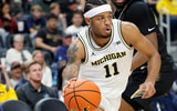 Michigan Wolverines guard Roddy Gayle Jr. (11) dribbles in the first half against the Oakland Golden Grizzlies at Little Caesars Arena. Mandatory Credit: Rick Osentoski-Imagn Images