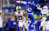 Oct 26, 2024; Lexington, Kentucky, USA; Auburn Tigers running back Jarquez Hunter (27) runs the ball during the fourth quarter against the Kentucky Wildcats at Kroger Field. Mandatory Credit: Jordan Prather-Imagn Images