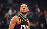 Devin Booker reacts during the first half at Intuit Dome - Gary A. Vasquez, Imagn Images