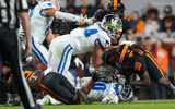 Tennessee defensive lineman Dominic Bailey (90) tackles Kentucky running back Jamarion Wilcox (10) during a NCAA football game between Tennessee and Kentucky in Neyland Stadium on Saturday, Nov. 2, 2024. © Angelina Alcantar/News Sentinel / USA TODAY NETWORK via Imagn Images