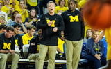 Michigan head coach Dusty May, center, and assistant coach Mike Boynton Jr. react to a play against Cleveland State during the second half at Crisler Center in Ann Arbor on Monday, Nov. 4, 2024. (Junfu Han/USA Today Syndication)
