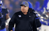 Kentucky Wildcats head coach Mark Stoops runs onto the field before a game against the Vanderbilt Commodores at Kroger Field. Mandatory Credit: Jordan Prather-Imagn Images
