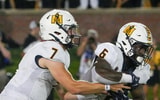 Aug 29, 2024; Columbia, Missouri, USA; Murray State Racers quarterback Jayden Johannsen (7) hands off to running back Kywon Morgan (6) against the Missouri Tigers during the first half at Faurot Field at Memorial Stadium. Mandatory Credit: Denny Medley-Imagn Images