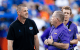 Florida Gators head coach Billy Napier and LSU Tigers head coach Brian Kelly talk before the game at Steve Spurrier Field at Ben Hill Griffin Stadium in Gainesville, FL on Saturday, October 15, 2022. [Matt Pendleton/Gainesville Sun] Ncaa Football Florida Gators Vs Lsu Tigers