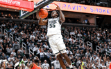 Michigan State's Coen Carr dunks against Bowling Green during the second half on Saturday, Nov. 16, 2024, Breslin Center in East Lansing. (© Nick King/Lansing State Journal / USA TODAY NETWORK via Imagn Images)