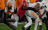 (Joshua L. Jones / USA TODAY NETWORK via Imagn Images) Georgia linebacker Smael Mondon Jr. (2) sacks Tennessee quarterback Nico Iamaleava (8) during the first half of a NCAA college football game against Tennessee in Athens, Ga., on Saturday, Nov. 16, 2024.