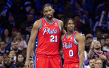 Philadelphia 76ers center Joel Embiid (21) and guard Tyrese Maxey (0) stand together during a break in action - Bill Streicher, Imagn Images