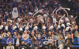 Kentucky students hold signs in the eRupption Zone - Dr. Michael Huang, Kentucky Sports Radio