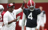 Alabama WR coach JaMarcus Shephard and QB Jalen Milroe