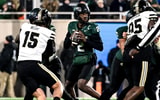 Michigan State's Aidan Chiles looks to throw against Purdue during the fourth quarter on Friday, Nov. 22, 2024, at Spartan Stadium in East Lansing - Nick King, USA TODAY Sports