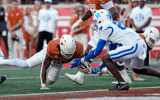 Texas RB Jaydon Blue scores a touchdown against Kentucky