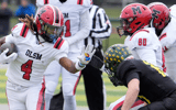Orchard Lake St. Marys and Michigan State wide receiver commit Bryson Williams runs for extra yardage against the Birmingham Groves defense during first half action between the two schools in the MHSAA Division 2 semifinal game - Eric Seals, USA TODAY Sports