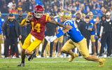 USC quarterback Jayden Maiava scrambles away from a UCLA defender