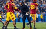 USC defensive coordinator D'Anton Lynn reacts on the sideline during a game against the UCLA Bruins