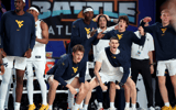 West Virginia players celebrate a win over Gonzaga