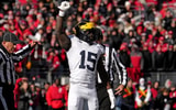 Michigan Wolverines linebacker Ernest Hausmann (15) celebrates after tackling Ohio State Buckeyes quarterback Will Howard (18) during the first half of Saturday‚Äôs NCAA Division I football game at Ohio Stadium.