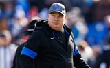 Kentucky Wildcats head coach Mark Stoops walks onto the field before the game against the Louisville Cardinals at Kroger Field. Mandatory Credit: Jordan Prather-Imagn Images