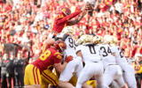 USC quarterback Jayden Maiava reaches the ball over the Notre Dame defensive line for a touchdown against the Fighting Irish