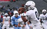 East Lansing's Jace Clarizio (Michigan State signee) snags a pass against Everett, Friday, Oct. 11, 2024, which he ran in for a Trojan TD. East Lansing won 39-26. - Matthew Dae Smith, USA TODAY Sports
