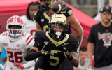 Sep 28, 2024; Winston-Salem, North Carolina, USA; Wake Forest Demon Deacons wide receiver Horatio Fields (5) makes a catch against the Louisiana-Lafayette Ragin Cajuns during the second half at Allegacy Federal Credit Union Stadium. Mandatory Credit: Jim Dedmon-Imagn Images