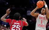 Ohio State Buckeyes guard Meechie Johnson Jr. (1) shoots over Rutgers Scarlet Knights guard Jeremiah Williams (25) during the second half of the NCAA men's basketball game at Value City Arena in Columbus on Saturday, Dec. 7, 2024. Ohio State won 80-66. (© Adam Cairns/Columbus Dispatch / USA TODAY NETWORK via Imagn Images)