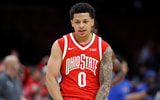 Ohio State Buckeyes guard John Mobley Jr. (0) celebrates a three pointer during the first half of the NCAA men's basketball game against the Pittsburgh Panthers at Value City Arena in Columbus on Friday, Nov. 29, 2024
