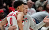 Ohio State Buckeyes head coach Jake Diebler talks to guard John Mobley Jr. (0) during the second half of the NCAA men's basketball game against the Valparaiso Beacons at Value City Arena in Columbus on Dec. 17, 2024. Ohio State won 95-73. (© Adam Cairns/Columbus Dispatch / USA TODAY NETWORK via Imagn Images)
