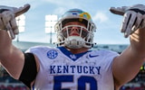 Kentucky lineman Koby Keenum (50) taunted the home crowd after Kentucky defeated Louisville 38-31 on Saturday afternoon at L&amp;N Stadium in Louisville, Ky. Nov. 25, 2023. (© Jeff Faughender/Courier Journal / USA TODAY NETWORK)