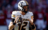 Missouri quarterback Brady Cook drops back to pass against Mississippi State. (Photo by Matt Bush-Imagn Images)