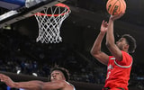 Ohio State F Sean Stewart scores over Kentucky C Amari Williams, via John Jones-Imagn Images