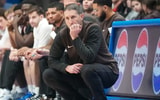 Brown Bears head coach Mike Martin watches play against the Kansas Jayhawks - Denny Medley, Imagn Images