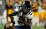 South Carolina transfer portal running back target Rahsul Faison at Utah State. Mandatory Credit: Troy Babbitt-Imagn Images