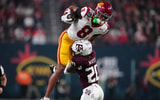 USC Trojans wide receiver Ja'Kobi Lane (8) catches the ball against Texas A&M Aggies defensive back BJ Mayes (20) in the second half at Allegiant Stadium
