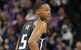 Dec 26, 2024; Sacramento, California, USA; Sacramento Kings guard De'Aaron Fox (5) looks over his shoulder after scoring a basket advantage during the fourth quarter at Golden 1 Center. Mandatory Credit: Kelley L Cox-Imagn Images