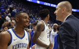 Kentucky coach Mark Pope talks to Lamont Butler after the win over Florida - Dr. Michael Huang, Kentucky Sports Radio
