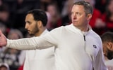 Dec 29, 2024; Athens, Georgia, USA; Georgia Bulldogs head coach Mike White reacts on the bench during the game against the South Carolina State Bulldogs at Stegeman Coliseum. Mandatory Credit: Dale Zanine-Imagn Images