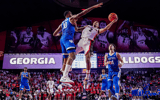 Jan 7, 2025; Athens, Georgia, USA; Georgia Bulldogs guard De'Shayne Montgomery (2) shoots against Kentucky Wildcats forward Brandon Garrison (10) during the second half at Stegeman Coliseum. Mandatory Credit: Dale Zanine-Imagn Images